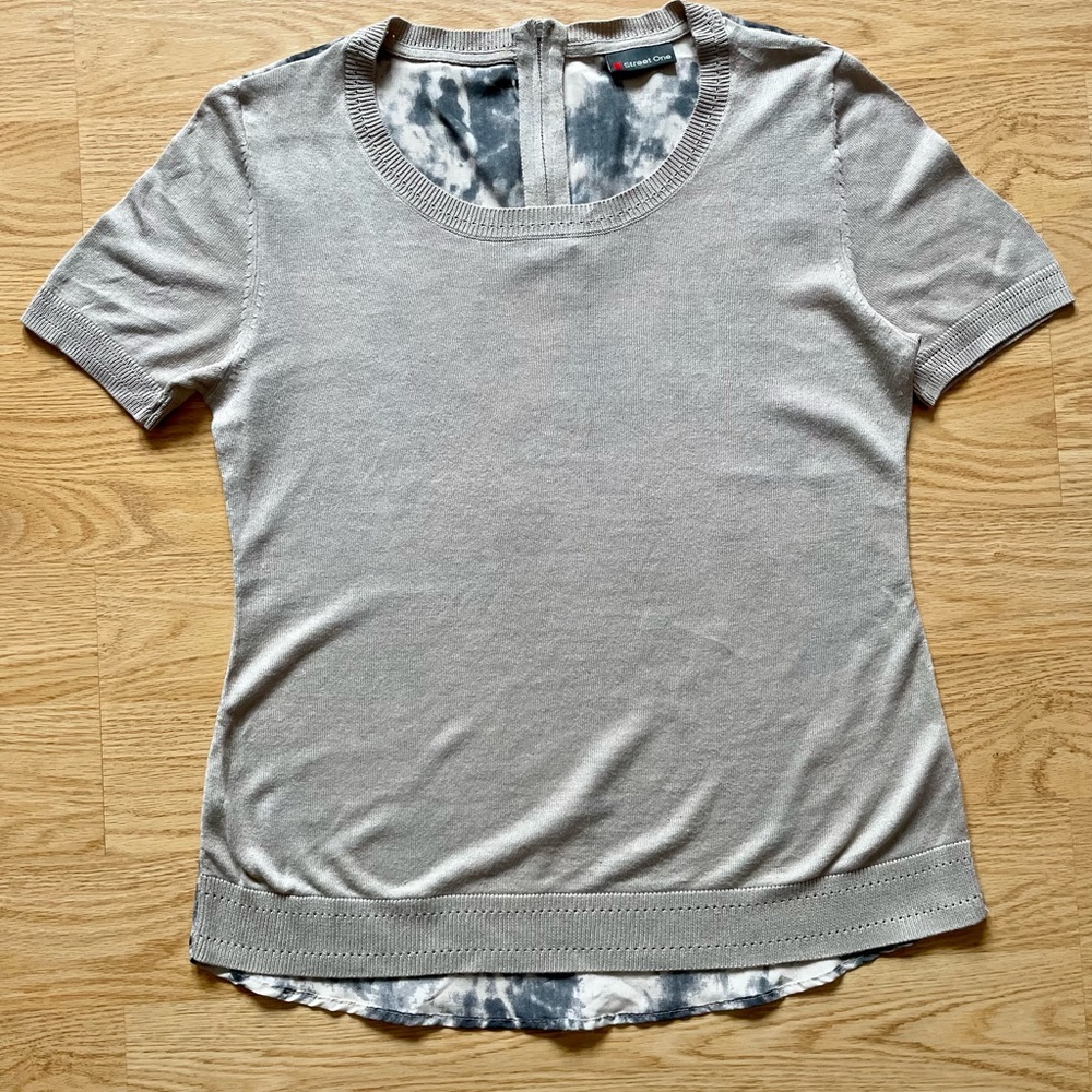 Contemporary short-sleeve beige knit top with cream/gray sheer patterned back